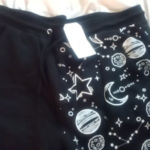 Brand new sweatpants half black and designs galaxy and stars and moon